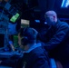 U.S. Navy Officers In Combat Information Center