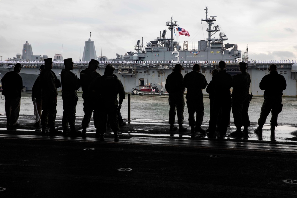 Wasp Sailors watch as USS Kearsarge pulls in to Naval Station Norfolk