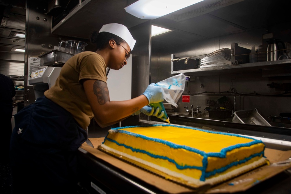 Sailor Decorates The Navy's Birthday Cake