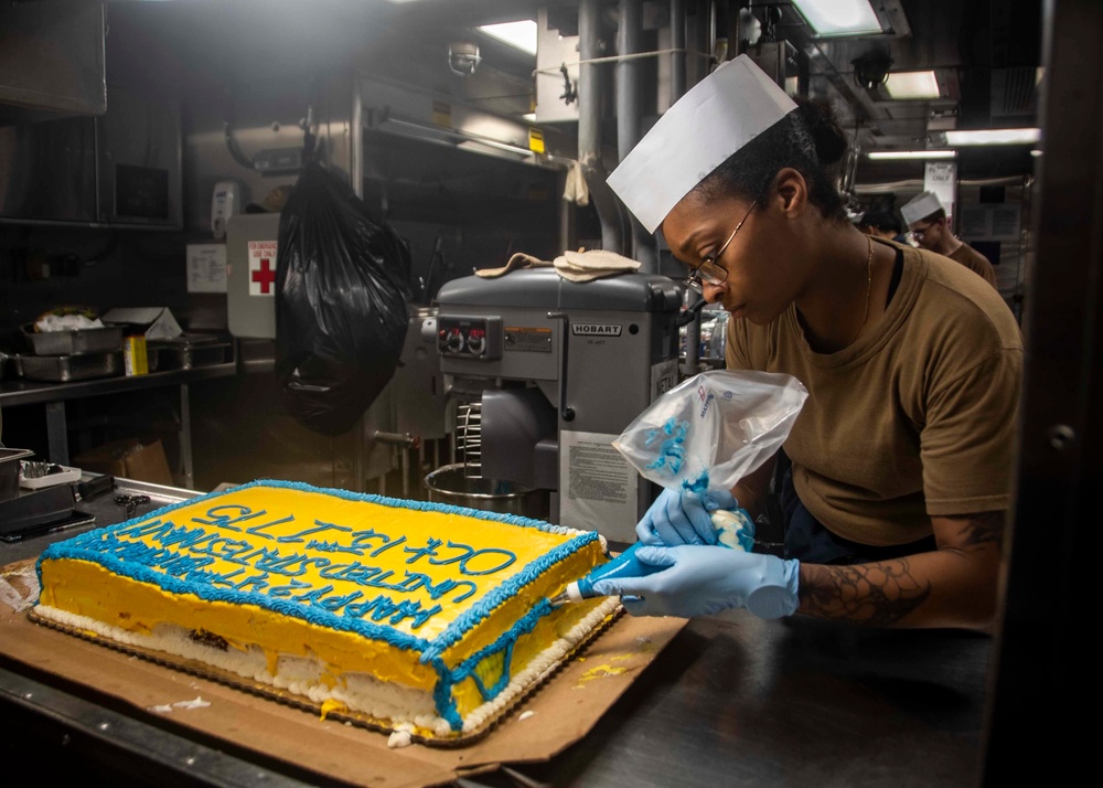 Sailor Decorates The Navy's Birthday Cake