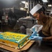 Sailor Decorates The Navy's Birthday Cake