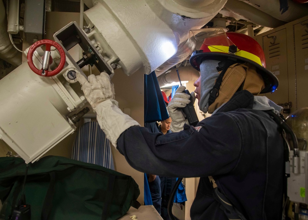 Sailors Participate In A Flying Squad Drill