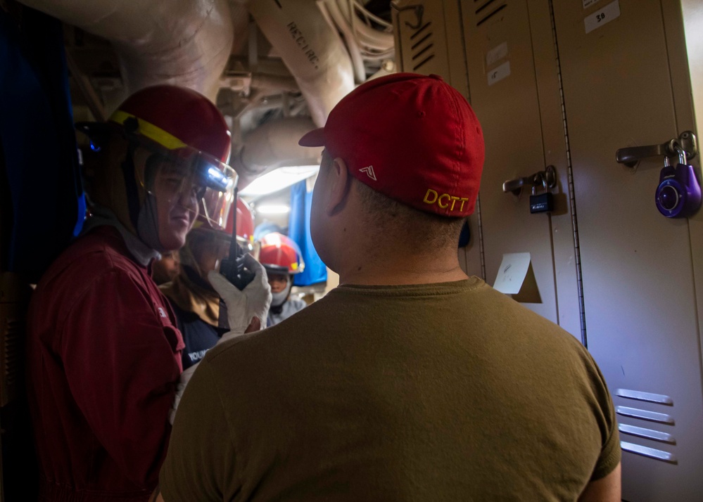 Sailors Participate In A Flying Squad Drill