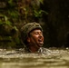 Marines tread through the jungle of Okinawa during The Jungle Warfare Training Course.