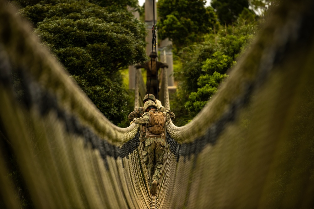 DVIDS - Images - Seabees cross rope bridge during Jungle Warfare Training.  [Image 4 of 5]