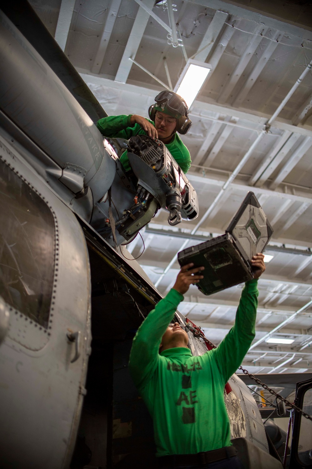 U.S. Navy Sailors Perform Maintenance