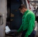 U.S. Navy Sailor Performs Maintenance