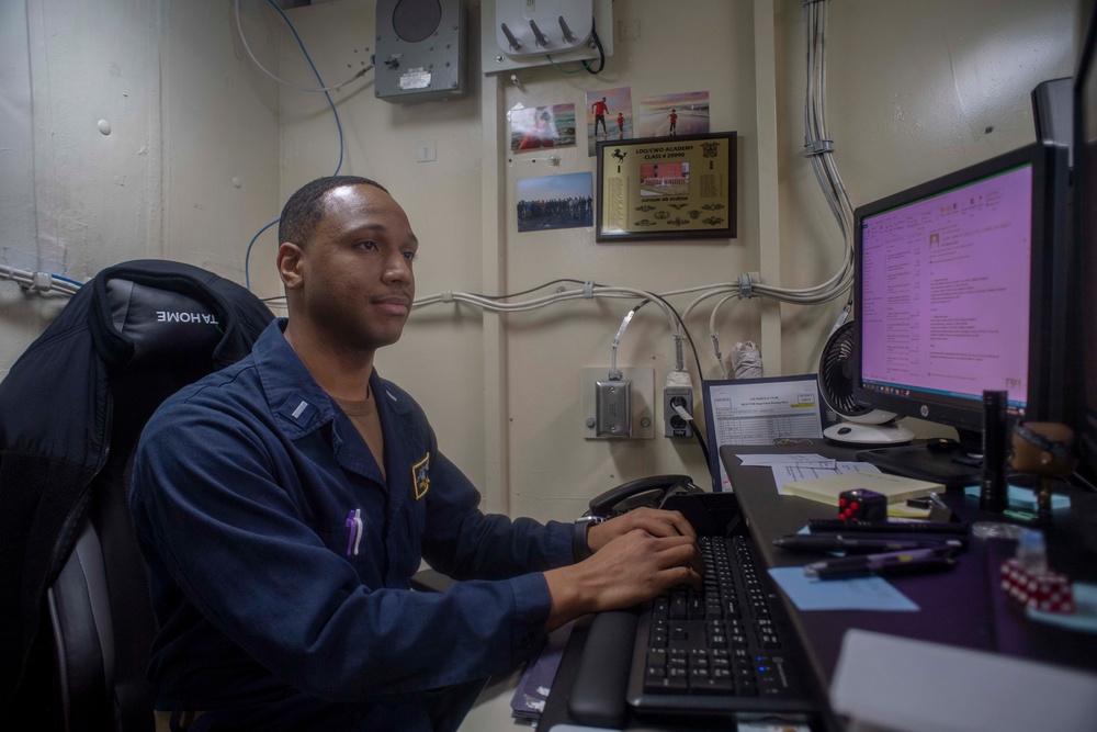 U.S. Navy Sailor Completes Personell Forms