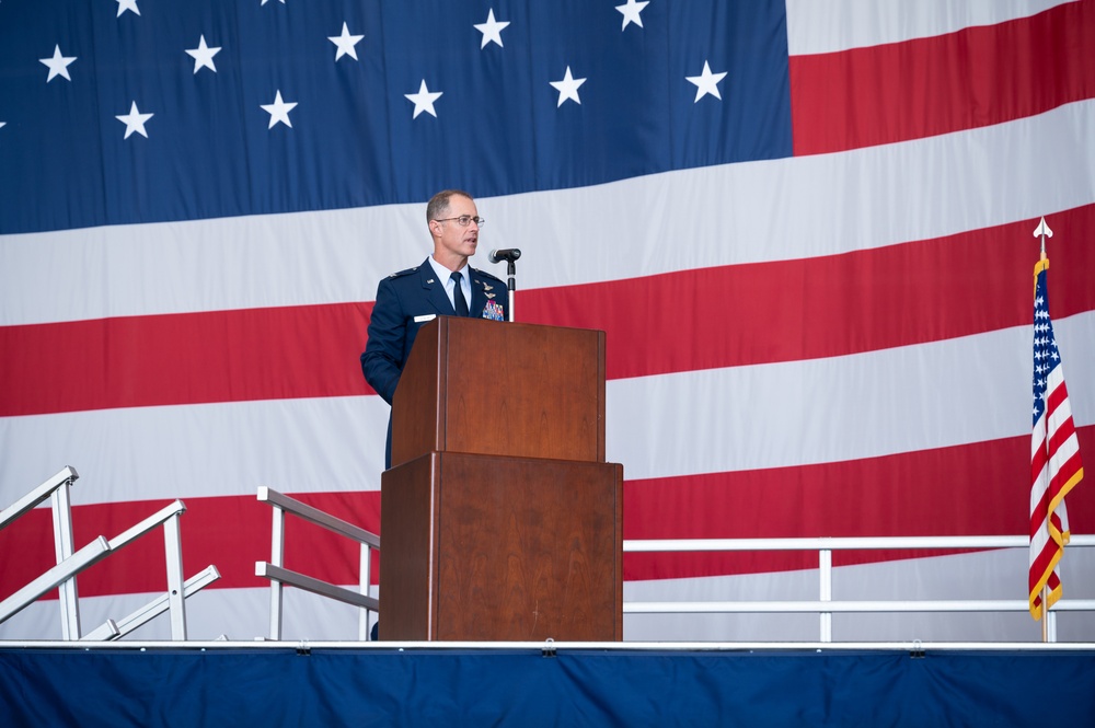 Photo of U.S. Air Force Col. Christopher Dunlap becoming 116th Air Control Wing commander during change-of-command ceremony.