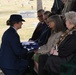 Mary Page presented with U.S flag