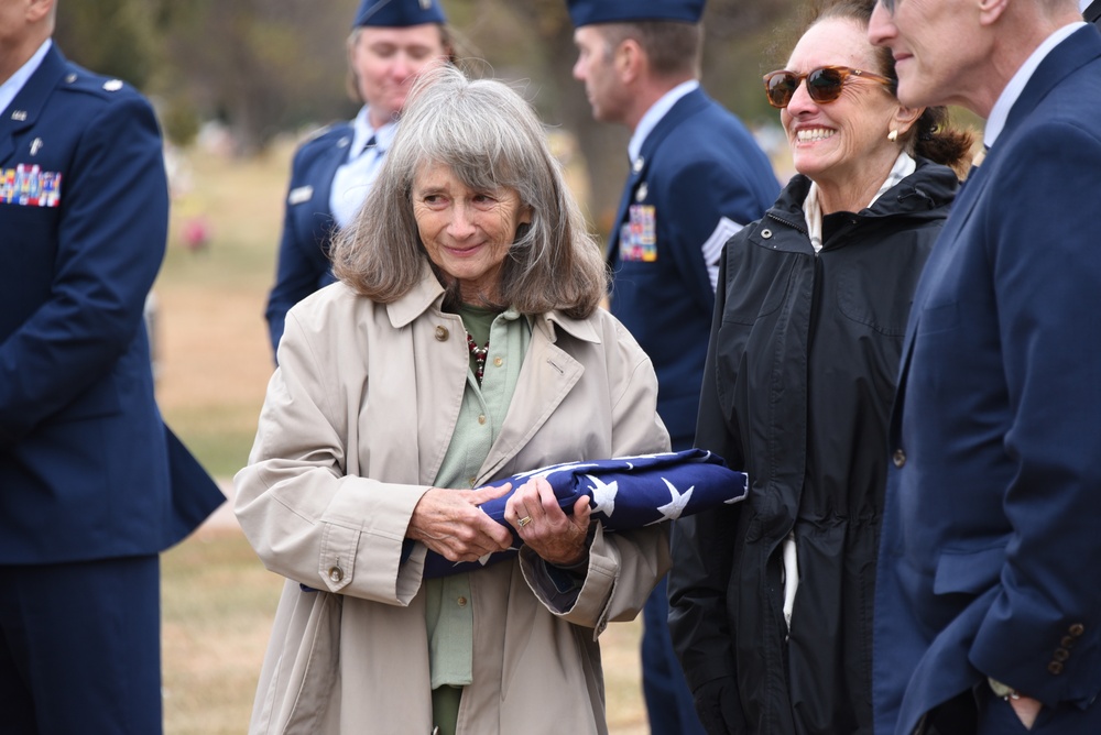 Mary Page holds her dad’s flag