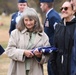 Mary Page holds her dad’s flag