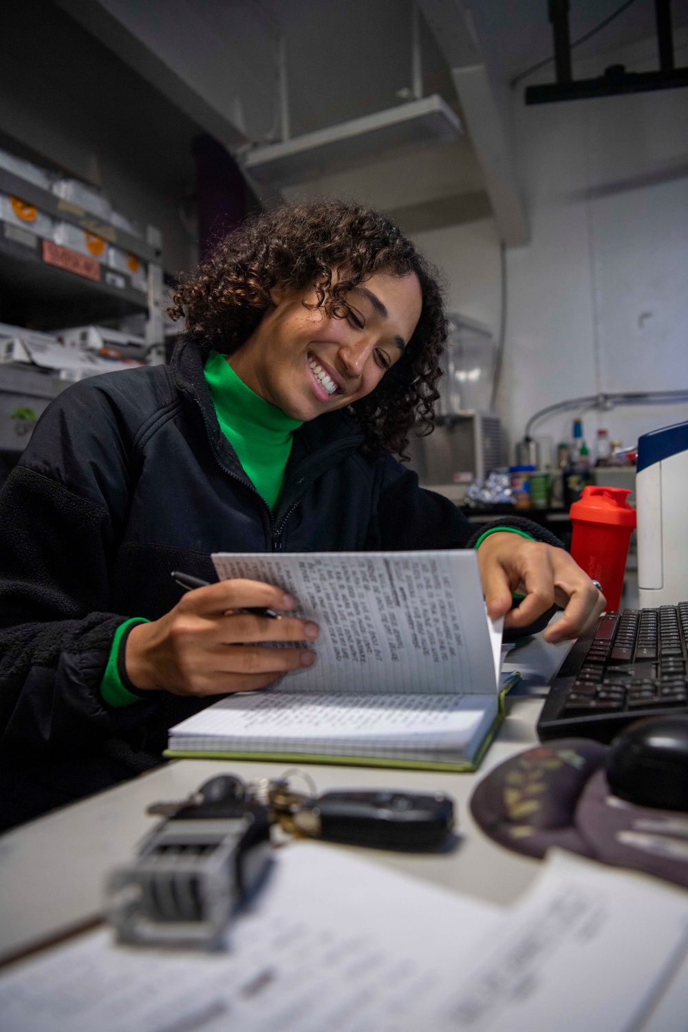 U.S. Navy Sailor Reviews Logbook