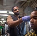 U.S. Navy Sailor Cuts Hair