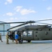 ROTC Cadets loading a Blackhawk