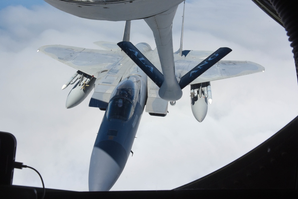 KC-135 Refuels F-16 Falcons and F-15 Eagles