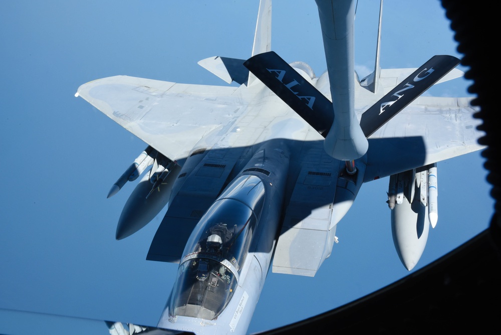 KC-135 Refuels F-16 Falcons and F-15 Eagles