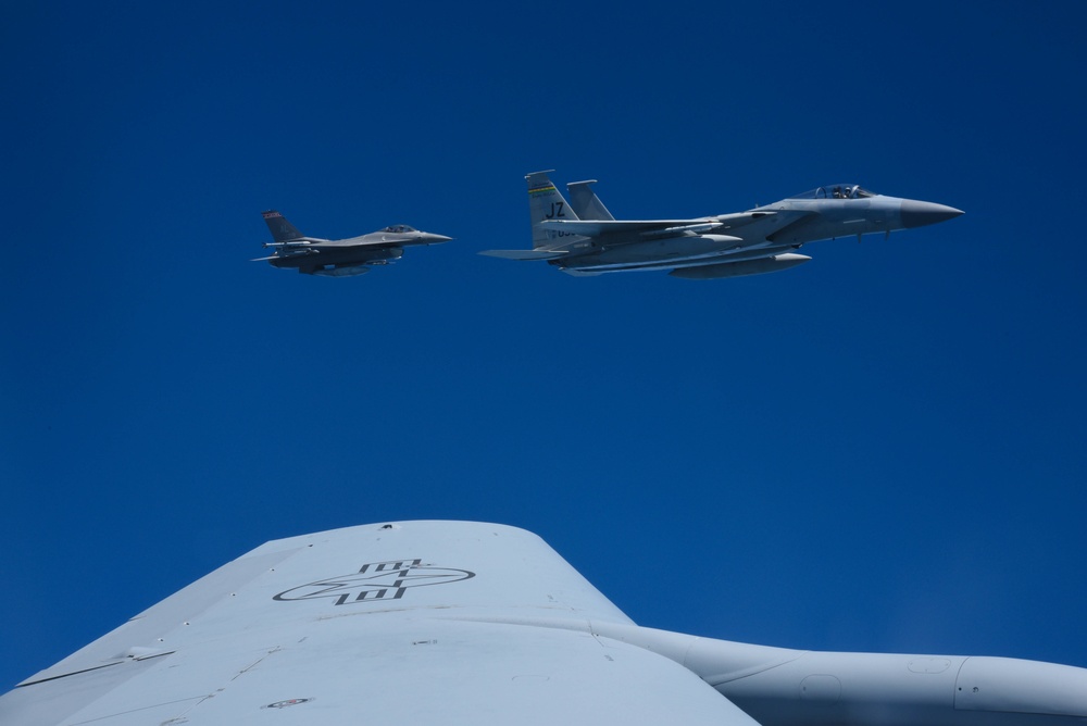 KC-135 Refuels F-16 Falcons and F-15 Eagles