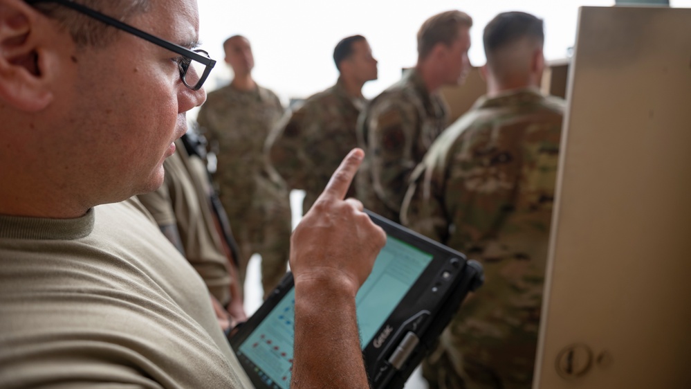 Service members assigned to the 435th Contingency Response Squadron, Ramstein AB in Germany complete MQ-9 training with fellow Airmen from the 163D Maintenance Squadron on March ARB.