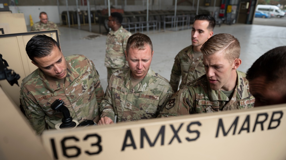 Service members assigned to the 435th Contingency Response Squadron, Ramstein AB in Germany complete MQ-9 training with fellow Airmen from the 163D Maintenance Squadron on March ARB.