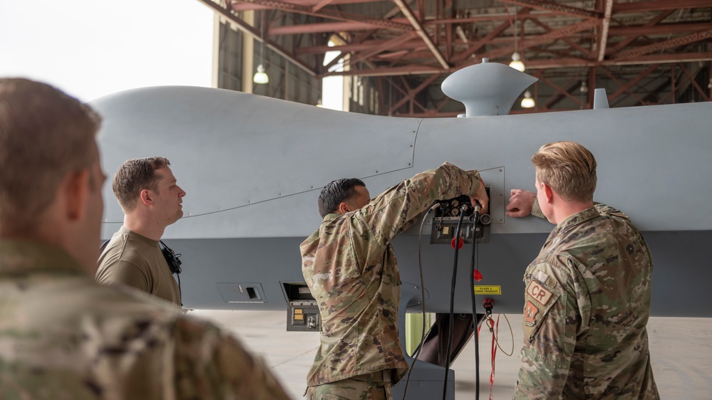 Service members assigned to the 435th Contingency Response Squadron, Ramstein AB in Germany complete MQ-9 training with fellow Airmen from the 163D Maintenance Squadron on March ARB.