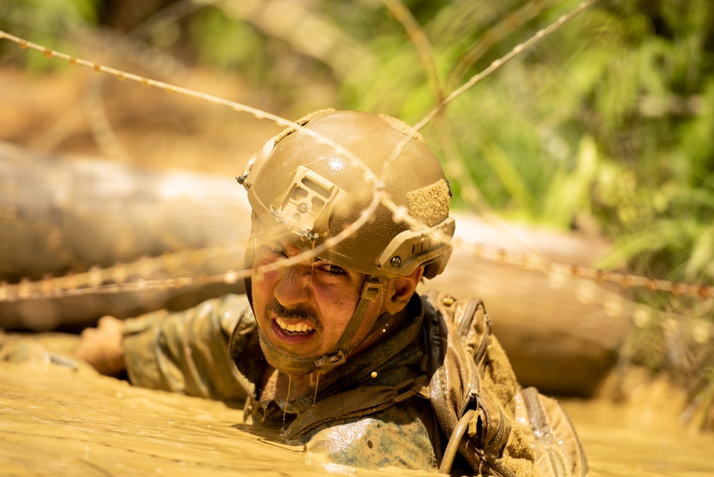 Marine's train in the deep jungle during the E-Course at The Jungle Warfare Training Center.