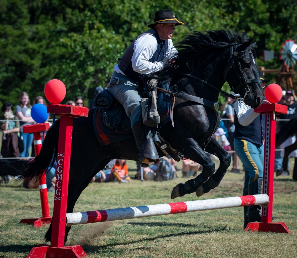 1st Infantry Division Commanding General's Mounted Color Guard participate in Chisholm Trail Festival