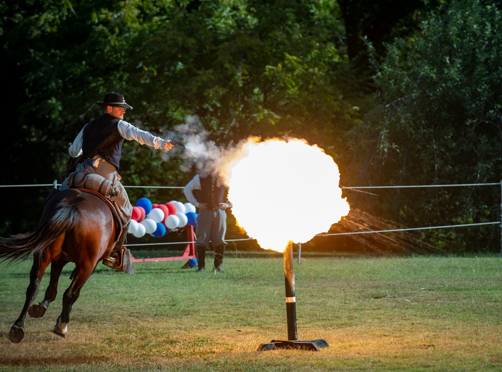 1st Infantry Division Commanding General's Mounted Color Guard participate in Chisholm Trail Festival