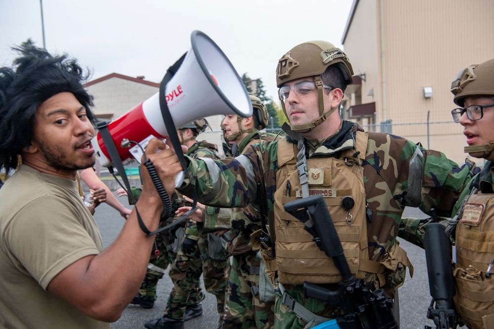 The 374th SFS conducts protest control exercise during SRI