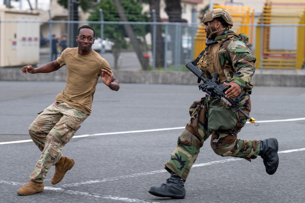 The 374th SFS conducts protest control exercise during SRI