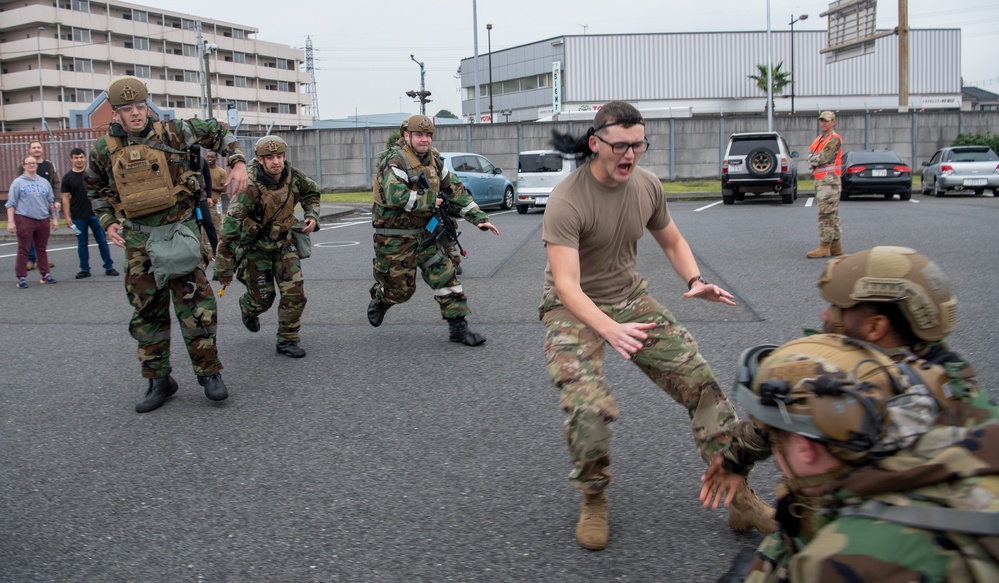 The 374th SFS conducts protest control exercise during SRI