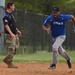 6th CES competes against 6th SFS in softball during Fire Prevention Week