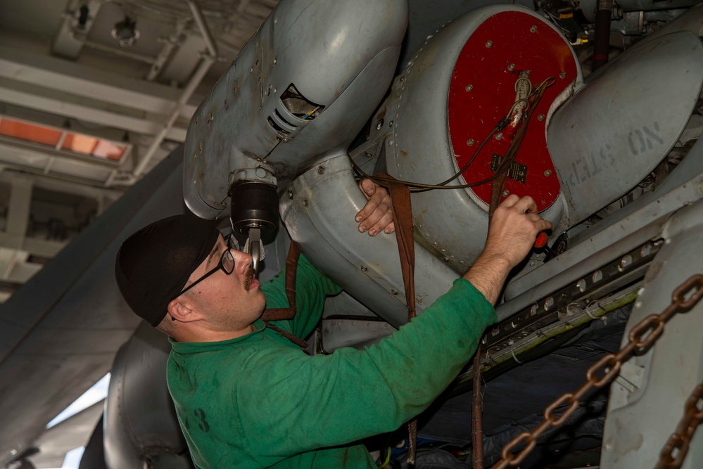 U.S. Navy Sailor Conducts Maintenance