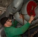 U.S. Navy Sailor Conducts Maintenance