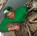 U.S. Navy Sailor Conducts Maintenance