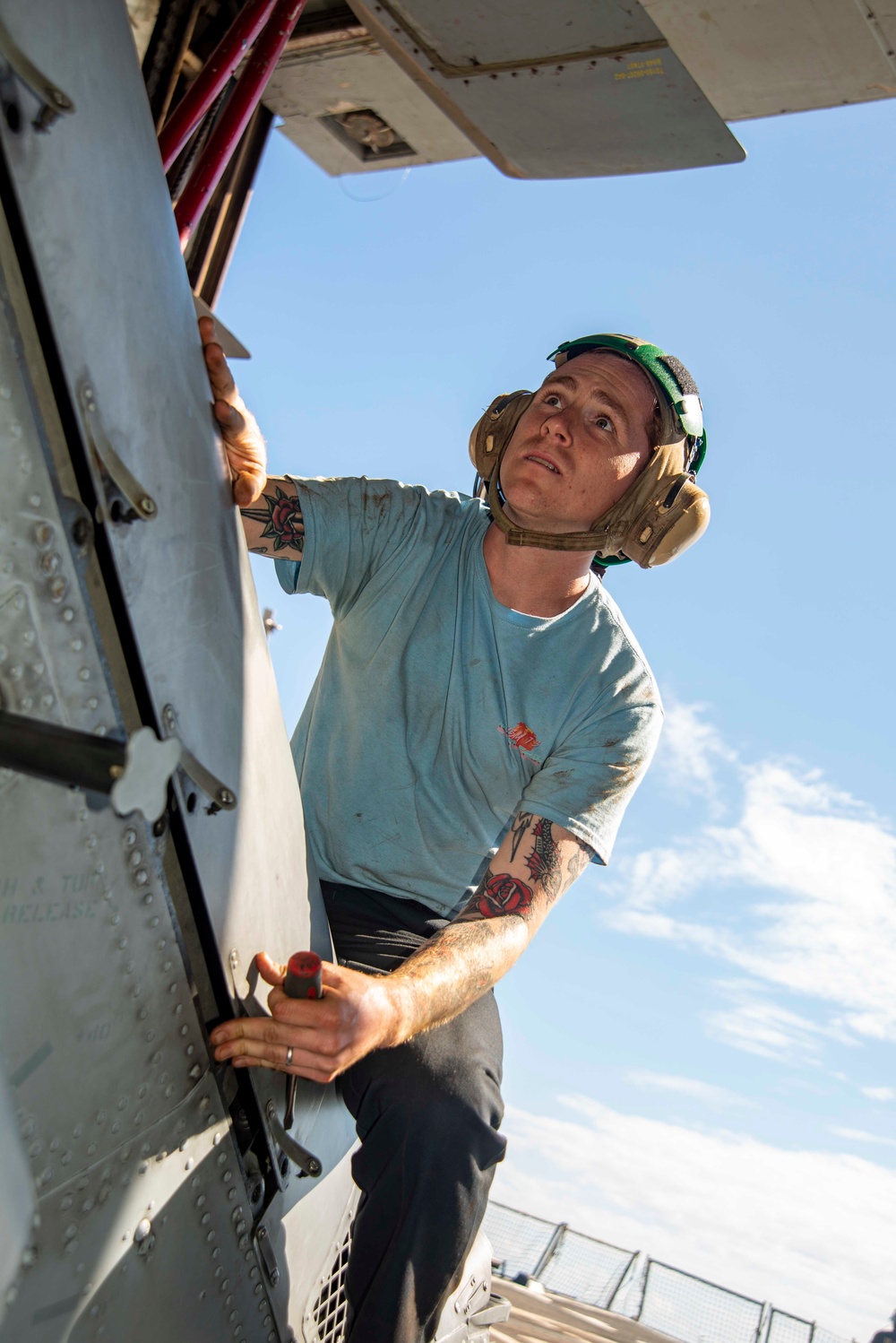 U.S. Navy Sailor Conducts Maintenance