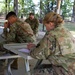 412th TEC Soldiers Pray during Religious Services
