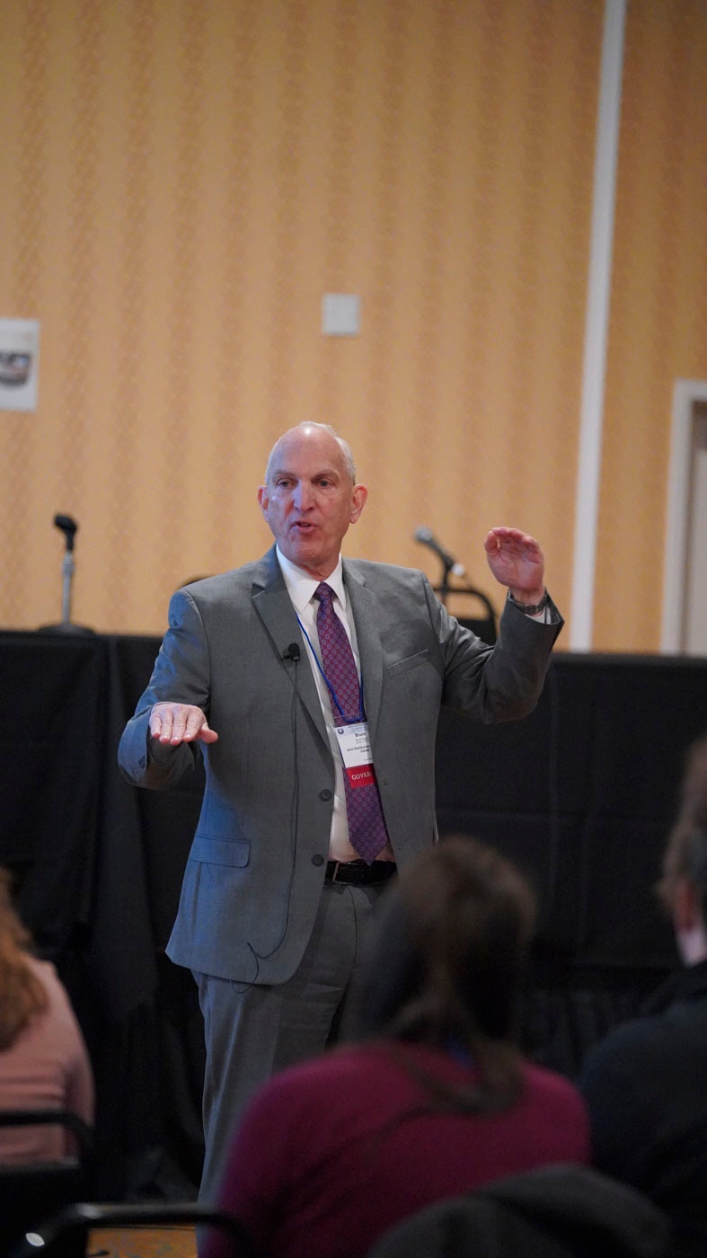 Bruce Bussler addresses the audience