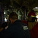 Coast Guard Cutter Hamliton crewmembers repair refrigerator while underway in the Atlantic Ocean