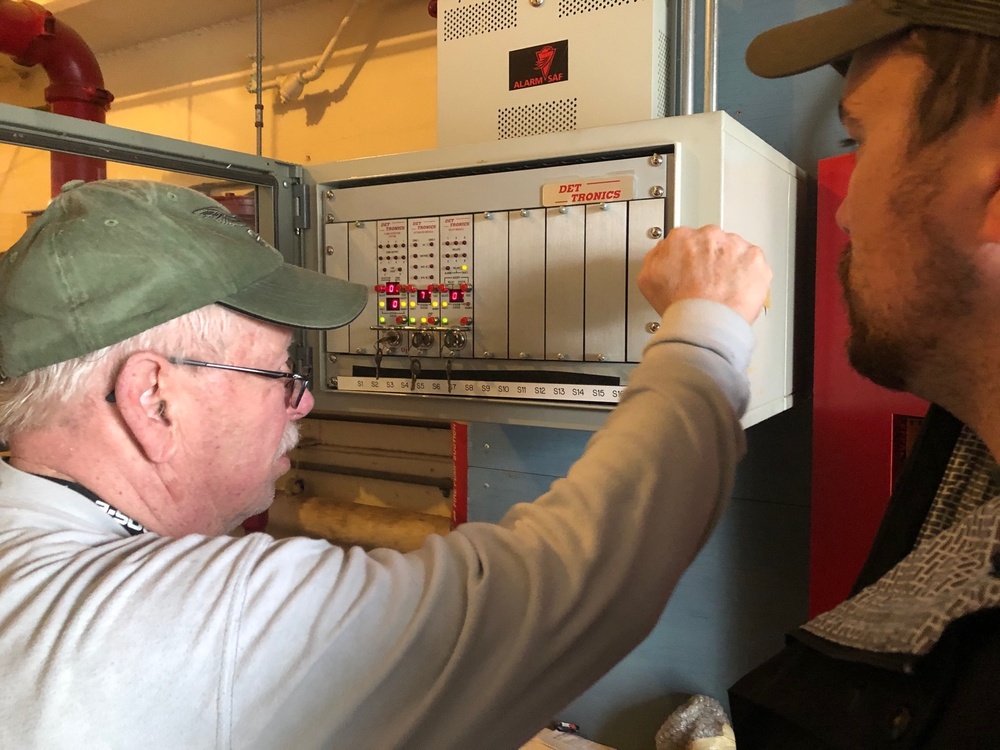Pat Levesque, fire alarm technician at NSF Dahlgren trains teammate