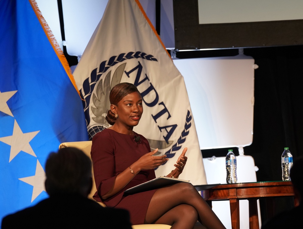 Chiderah Okoye moderates a cybersecurity panel at the 2022 National Defense Transportation Association – U.S. Transportation Command Fall Meeting