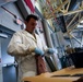 Maintainer cleans KC-135 engine parts