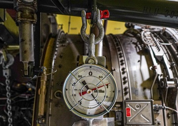 Heavy weight scale attached to aircraft engine