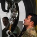 Aircraft maintainer inspects engine weight scale