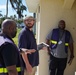 A FEMA Disaster Survivor Assistance Team Goes Door to Door Registering Survivors for Disaster Relief
