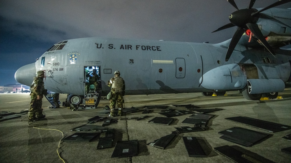 374th MXS armors a C-130J during an SRI