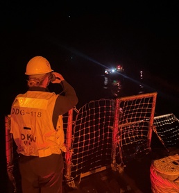 USS Daniel Inouye conducts towing operations for Sea Diamond off coast of Honolulu