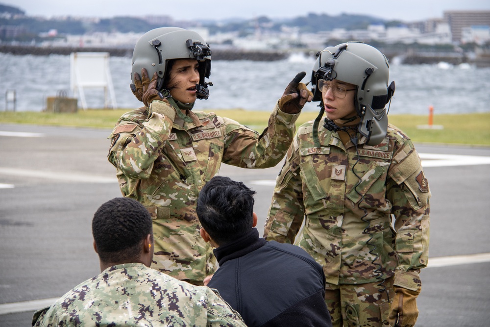 USNMRTC Yokosuka and Yokota Air Base Staff Education and Training (SEAT) partner to perform UH-1N helicopter mass casualty drill components