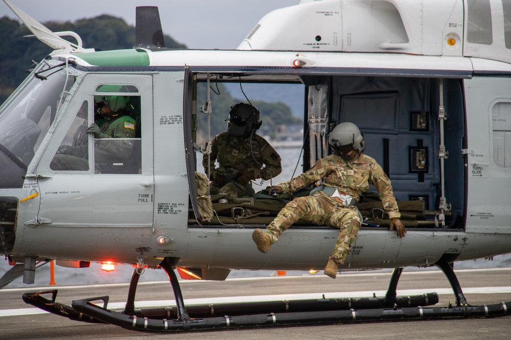 USNMRTC Yokosuka and Yokota Air Base Staff Education and Training (SEAT) partner to perform UH-1N helicopter mass casualty drill components