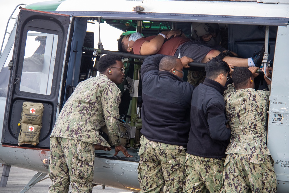 USNMRTC Yokosuka and Yokota Air Base Staff Education and Training (SEAT) partner to perform UH-1N helicopter mass casualty drill components